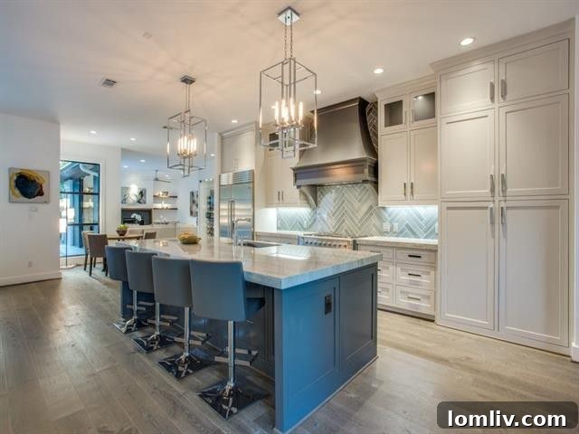 Sophisticated kitchen with high-end appliances and a large island in the Forest Place home