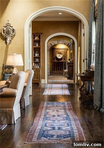 Stately Entrance and Archways of the Tuscan-Style Home