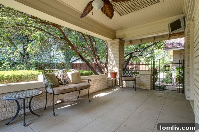 Inviting covered porch, perfect for relaxing summer evenings at 2718 Cockrell Avenue