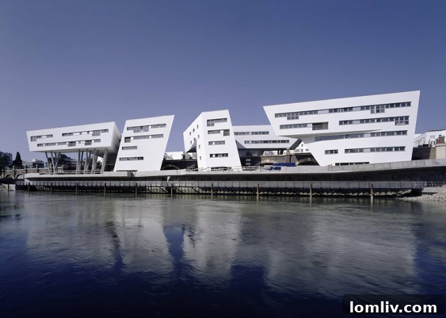 The Spittelau Viaducts Housing Project in Vienna, designed by Zaha Hadid, showing modern structures integrated with historic railway arches.