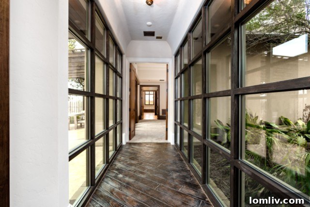Elegant hallway leading to the private master suite