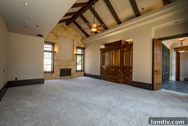 Spacious and serene master bedroom with luxurious furnishings