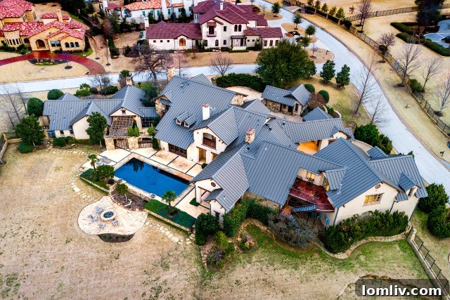 Aerial view of the expansive Vaquero property at sunset, showcasing over one acre of land