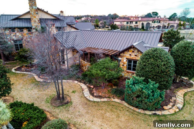 Lush landscaping surrounds the outdoor spaces, offering privacy and beauty