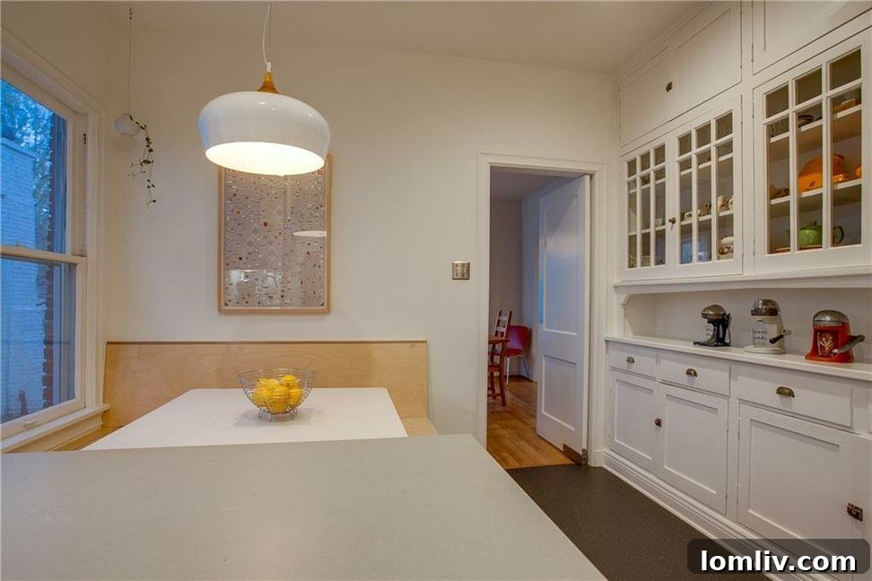 Unveiling North Oak Cliff's Singular Masterpiece 13 Laundry nook integrated into the hallway design