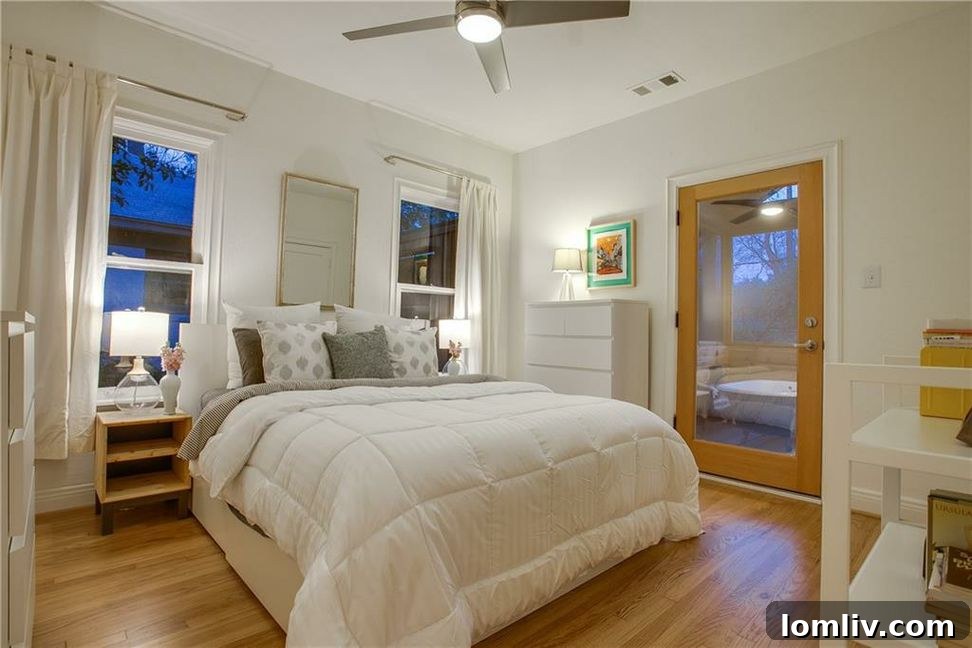 Unveiling North Oak Cliff's Singular Masterpiece 17 Bedroom with glass doors opening to the screened porch