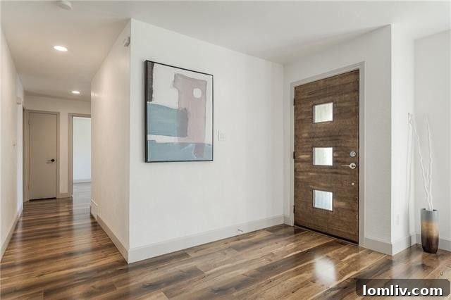 Bright and spacious living area with recessed lighting