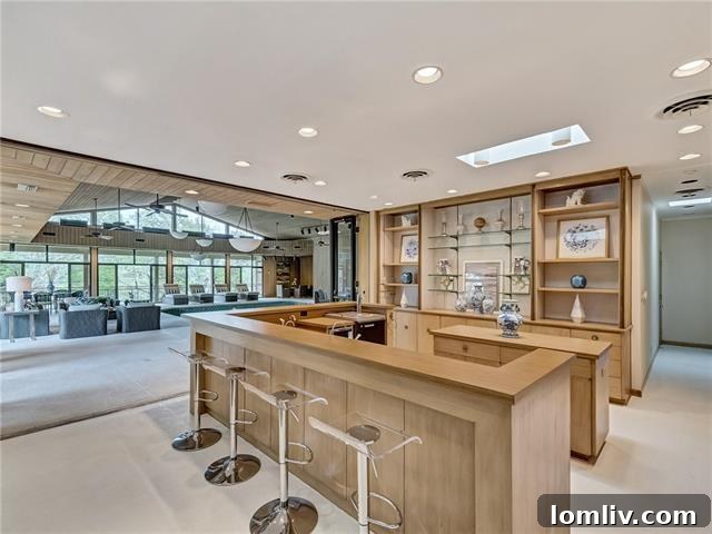 Second kitchen or caterer's kitchen within the Komatsu addition, featuring a spacious bar