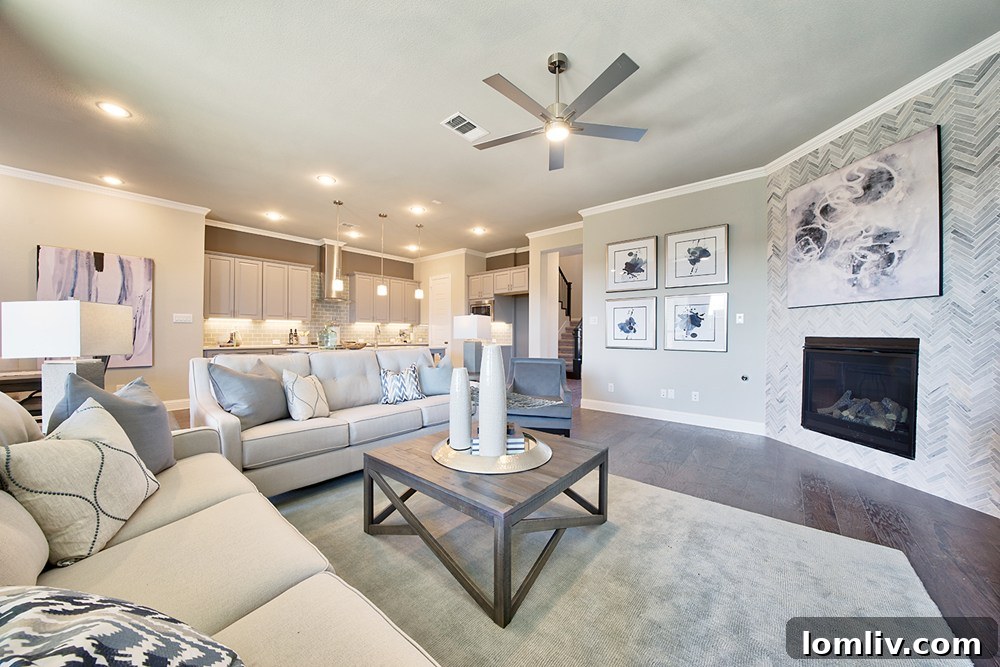 Spacious living area in a Megatel home, featuring hardwood floors and abundant natural light
