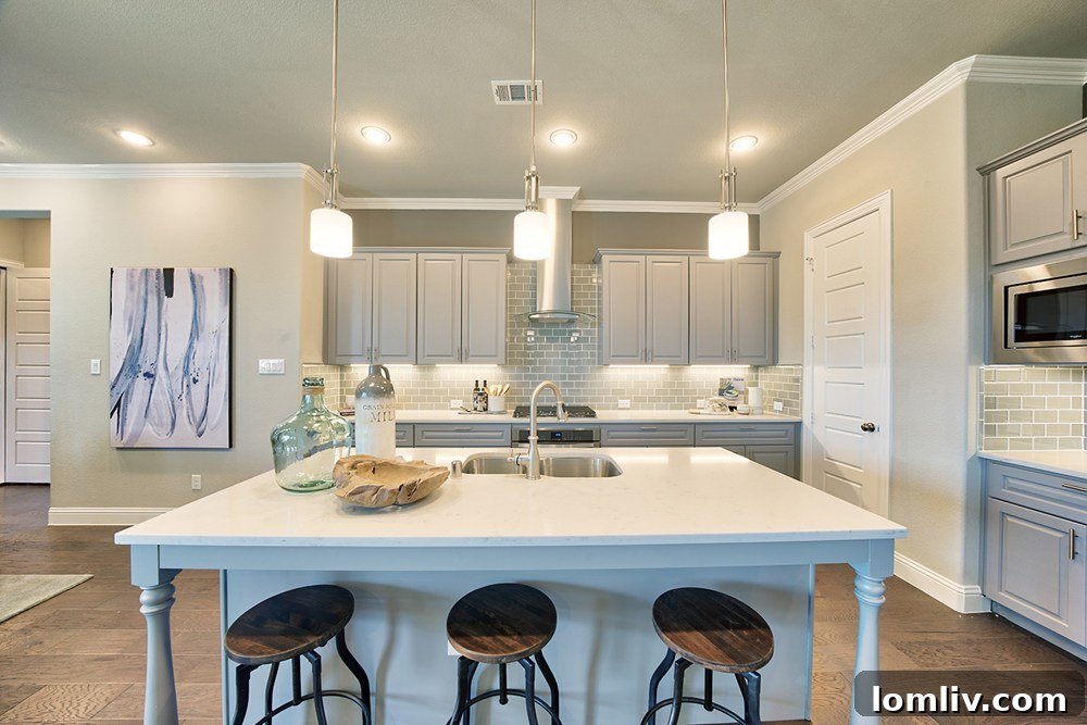 Elegant bathroom with quartz countertops and custom cabinetry in a Megatel home