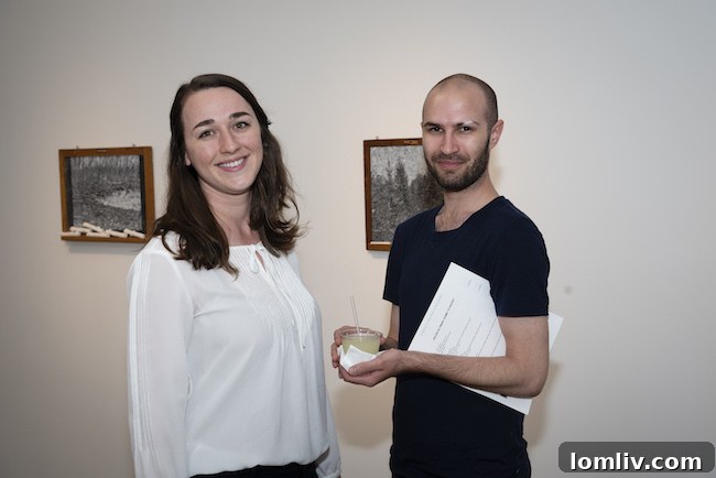 The McKenzie event attendees enjoying the gallery atmosphere