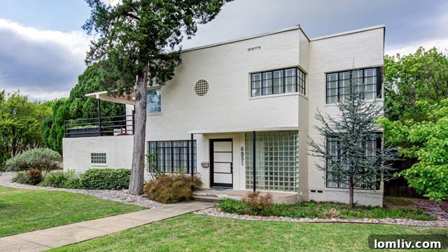 The sleek, streamlined exterior of an Art Deco home at 6851 Gaston Ave, Lakewood