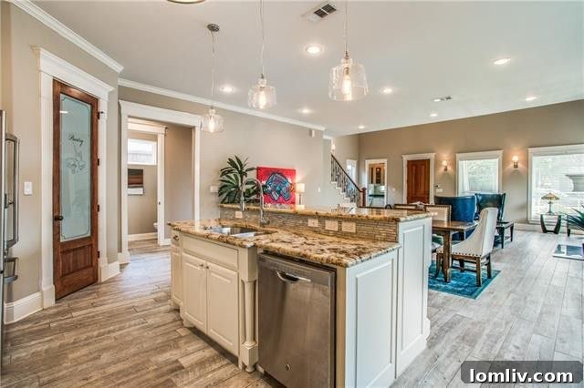 Expansive granite countertops and built-in gas range in Dallas kitchen