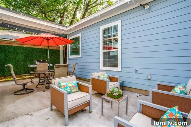 Inviting patio area next to the swimming pool, perfect for entertaining