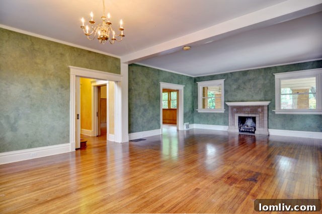 Spacious library with original raised panel dado in a historic Fort Worth house
