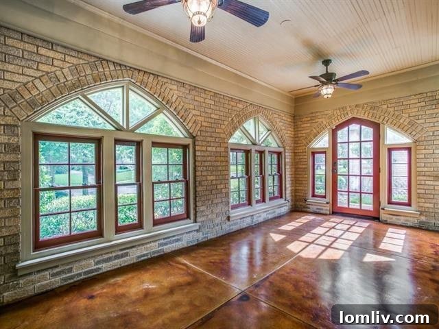 Sunroom with Gothic Arches, Exposed Brick, and Stained Concrete Floors