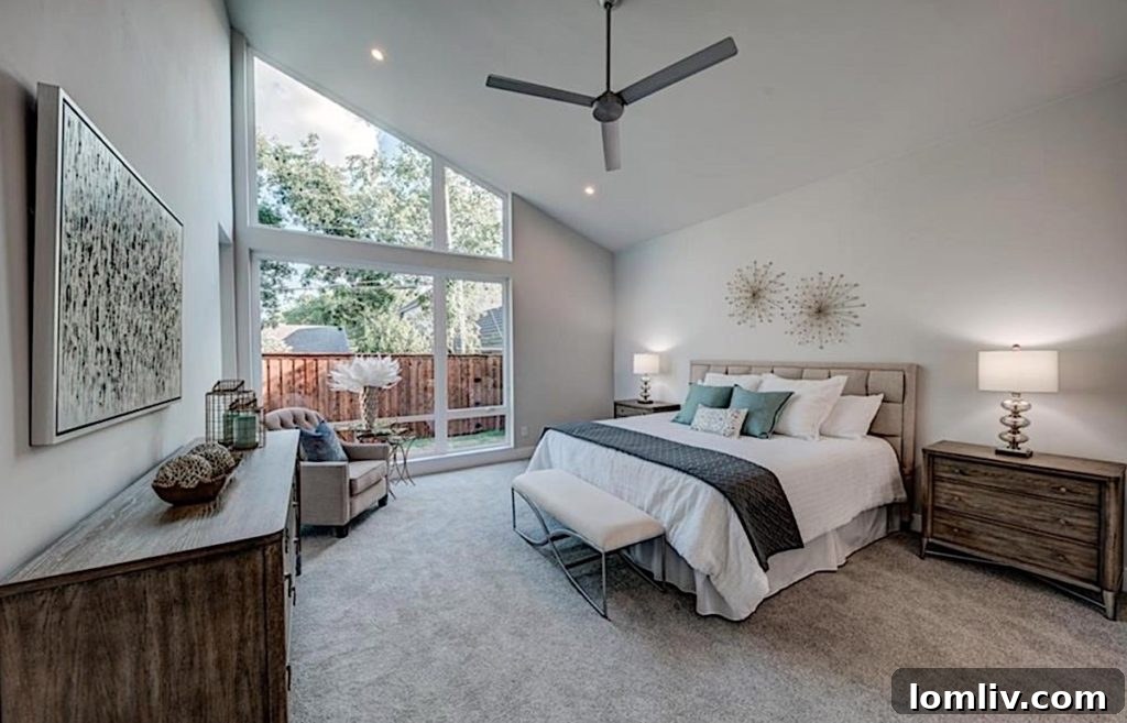 Elegant Owner's Suite with Angled Ceiling and Recessed Lighting