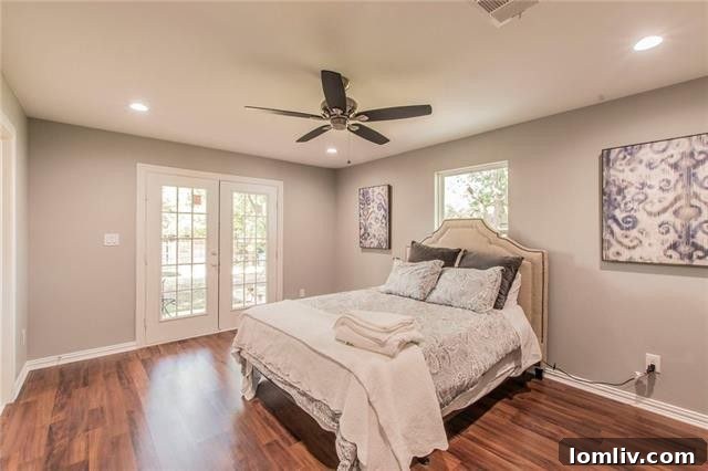 Renovated bedroom with ample natural light in Midway Hollow