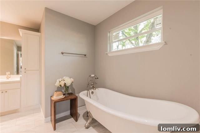 Guest bedroom with stylish staging and ample space