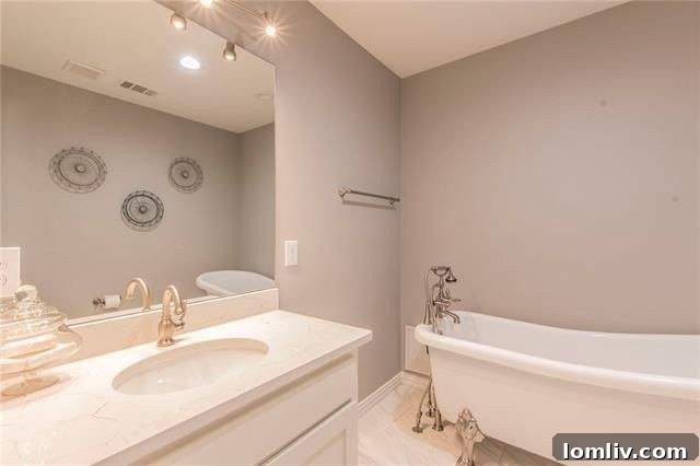 Stylish kitchen with subway tile backsplash and stainless steel appliances