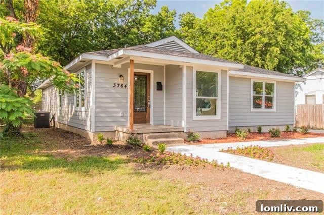 Modern gray siding and cedar post accent on a Dallas home