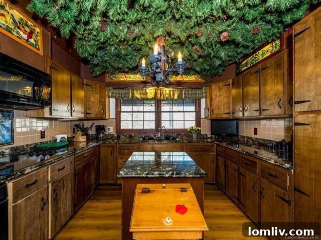 Deceptively Simple Exterior, Intriguingly Complex Interior 6 Kitchen featuring extensive ceiling greenery as a design element