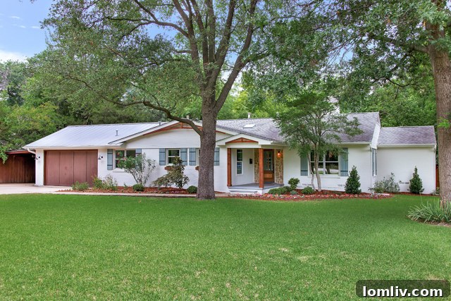 Modern Ranch Home Exterior with Mature Trees and Creek Lot near White Rock Lake
