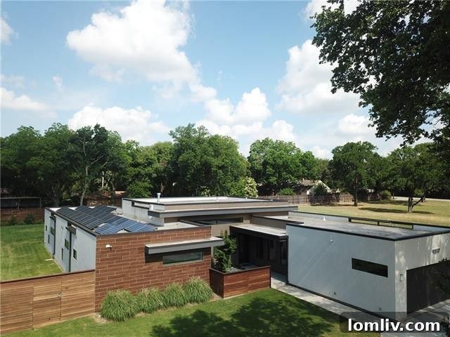 Modern Dallas home exterior with solar panels and sophisticated design at 9317 Midway Rd