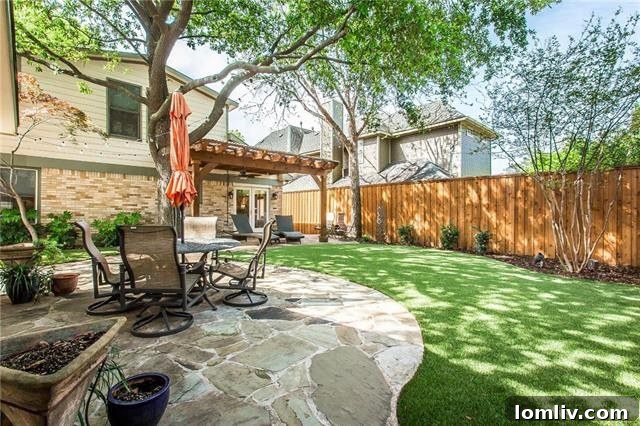Lush green lawn in the backyard of 5307 Merrimac