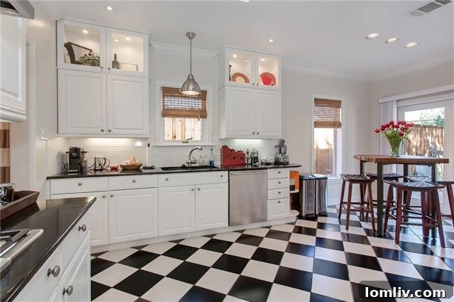 Charming kitchen with checkerboard tile and Shaker cabinets