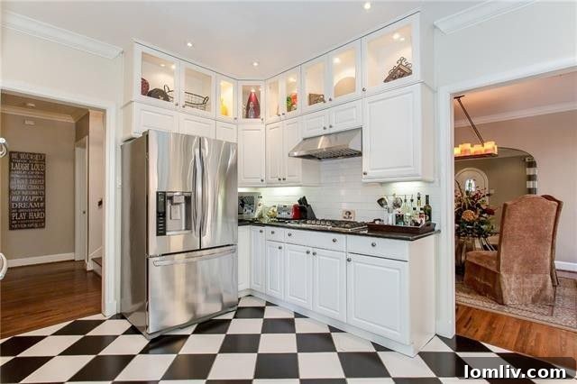 Kitchen view into a distinct living area