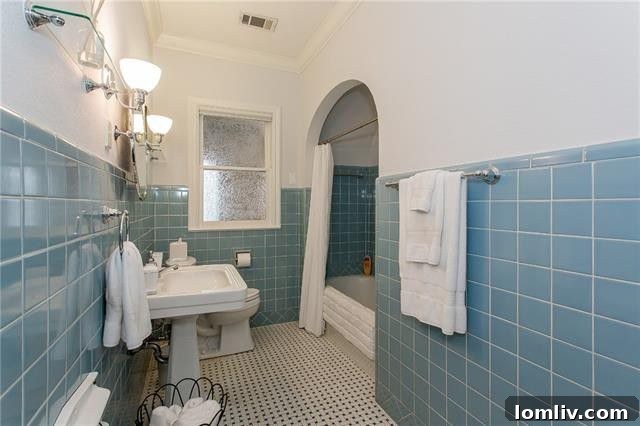 Adorable vintage tile in the first-floor bathroom at 5307 Merrimac