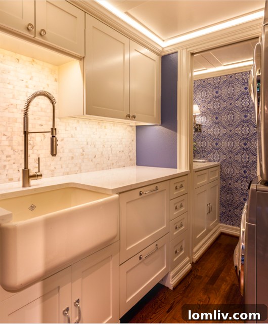 Renovated Laundry Room with Storage and Deep Sink