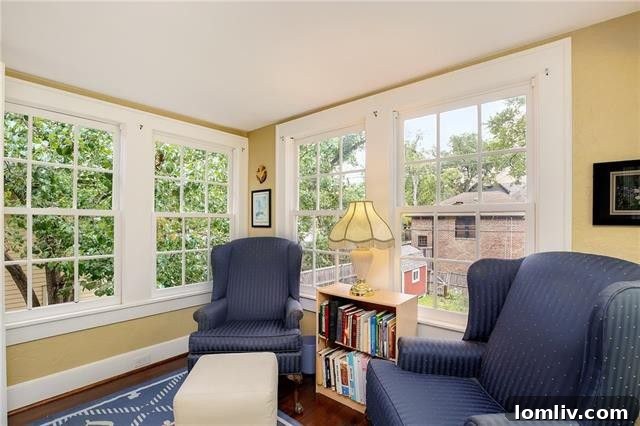 Another view of the cozy and inviting living area, highlighting its period details