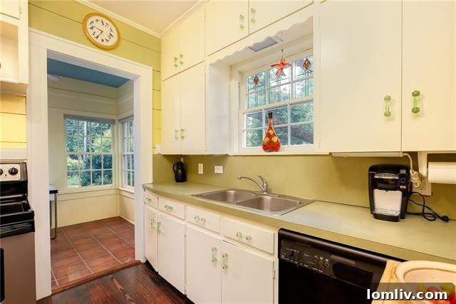 Another perspective of the sunroom, highlighting its brightness and connection to nature