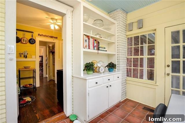 Detail shot of the kitchen's authentic shiplap and charming fixtures