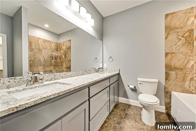 Stylish master bedroom with elegant hardwood floors and ample space