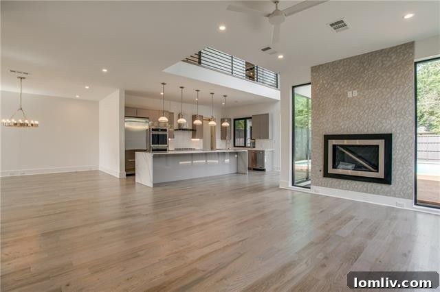 Modern living room with floor-to-ceiling windows and ample natural light