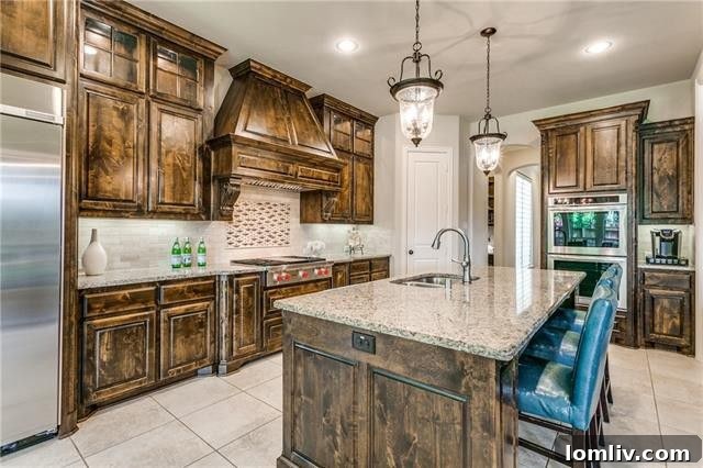Luxury Kitchen with Dual Ovens and Built-in Refrigerator