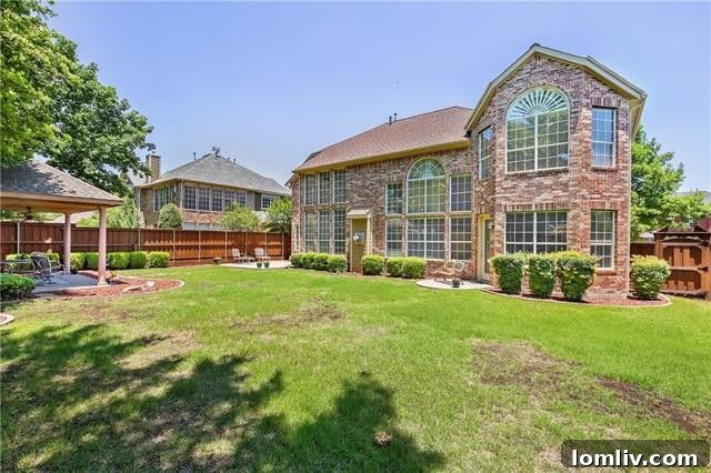 Spacious Backyard with Covered Pavilion and Privacy Fence