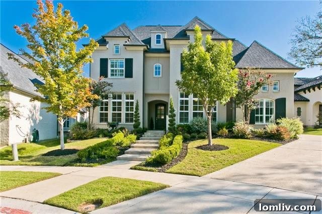 Elegant Entryway with Dramatic Staircase in Allen Custom Home
