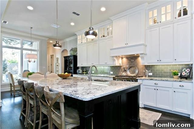 Gourmet Kitchen with Double Ovens and Large Island in Luxury Allen Home