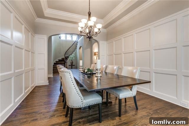 Elegant Formal Dining Room with Extensive Millwork in Allen Home