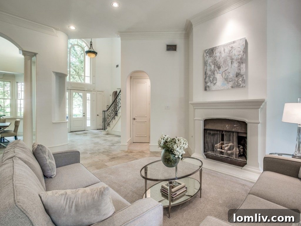 A stunning, renovated kitchen with classic white marble counters and subway tile backsplash