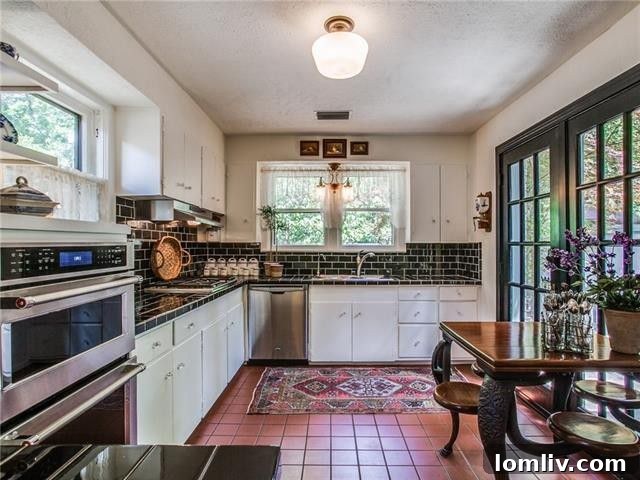Bright and airy eat-in kitchen opening to backyard