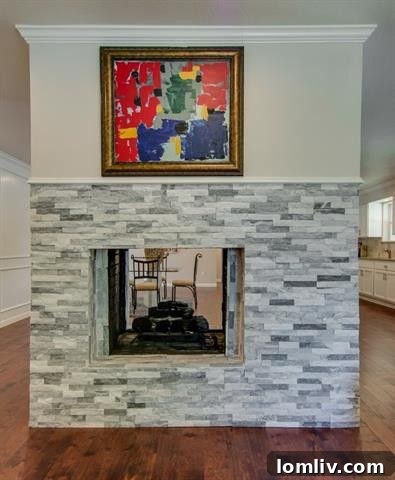 Contemporary Gas Cooktop and Stylish Range Hood in Renovated Kitchen
