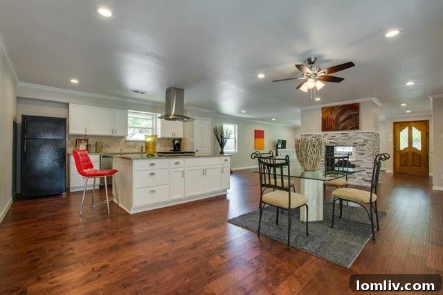 Elegant Kitchen Island with Ample Seating and Prep Space at 9659 Leaside Dr.