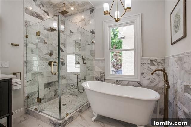Luxurious master bath with custom vanity and a spacious marble shower with triple-head system