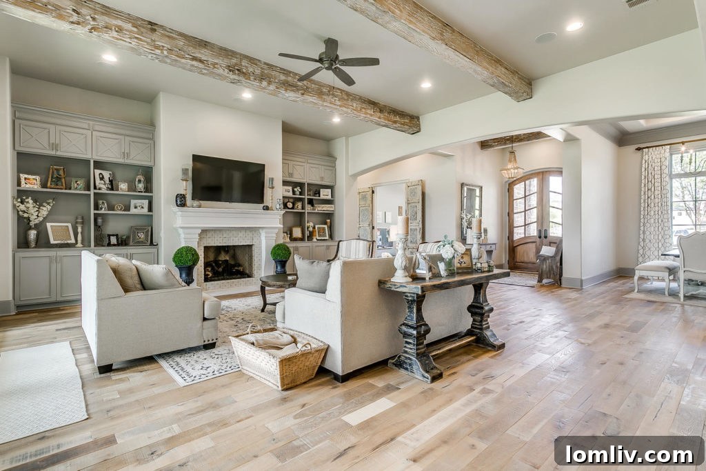 Spacious interiors with soaring twelve-foot ceilings and exquisite reclaimed wood accents at 5205 Caliza Court