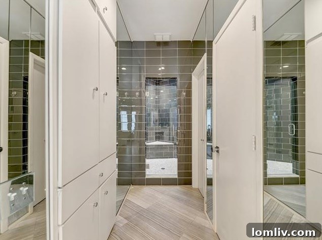 Elegant Carrara marble vanity with modern fixtures in the updated master bath